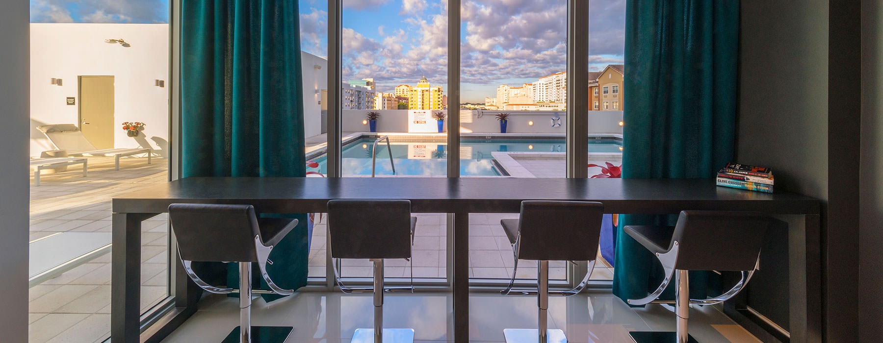 Desk area overlooking swimming pool
